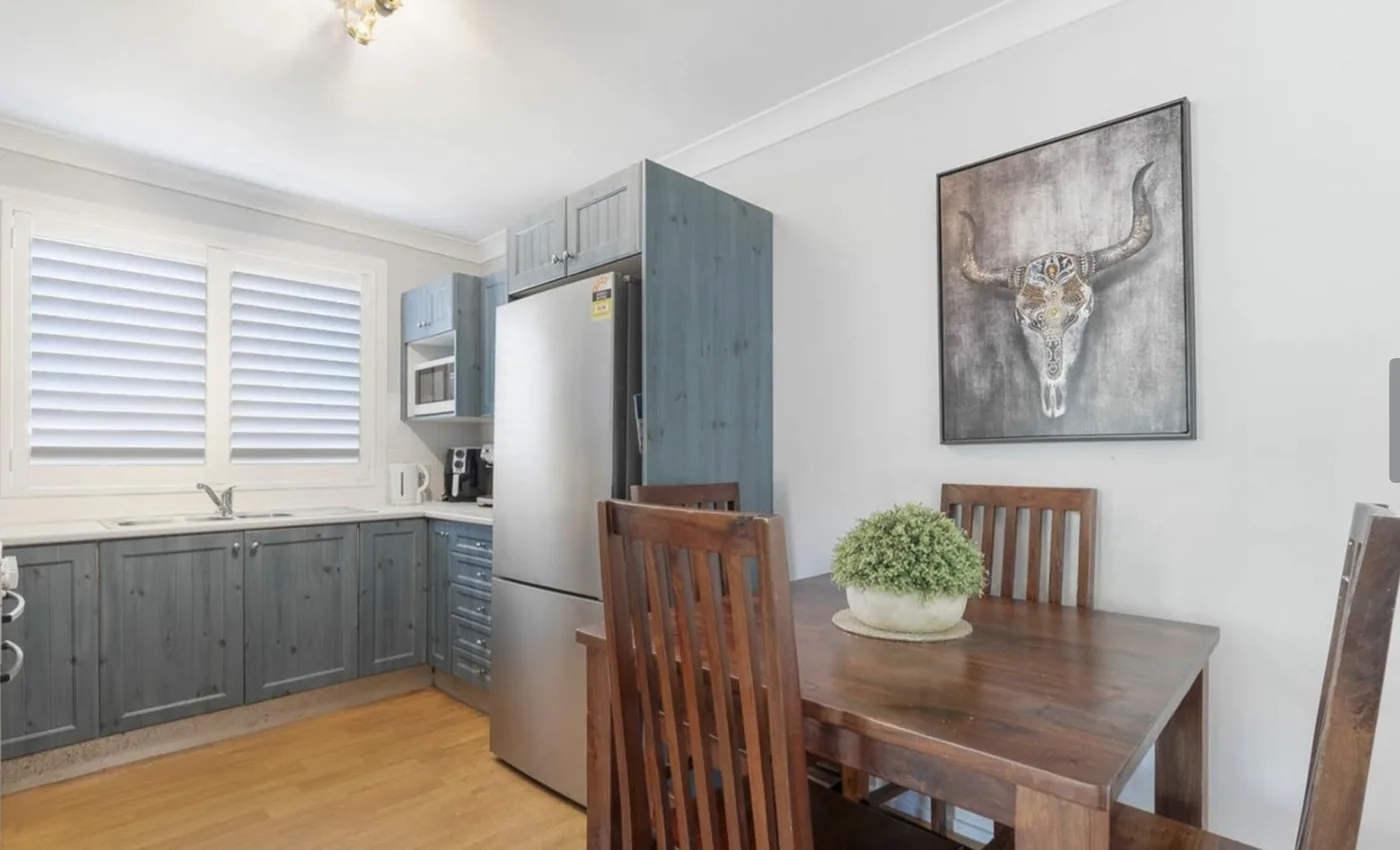Kitchen and dining area at the Argenton home with timber floors