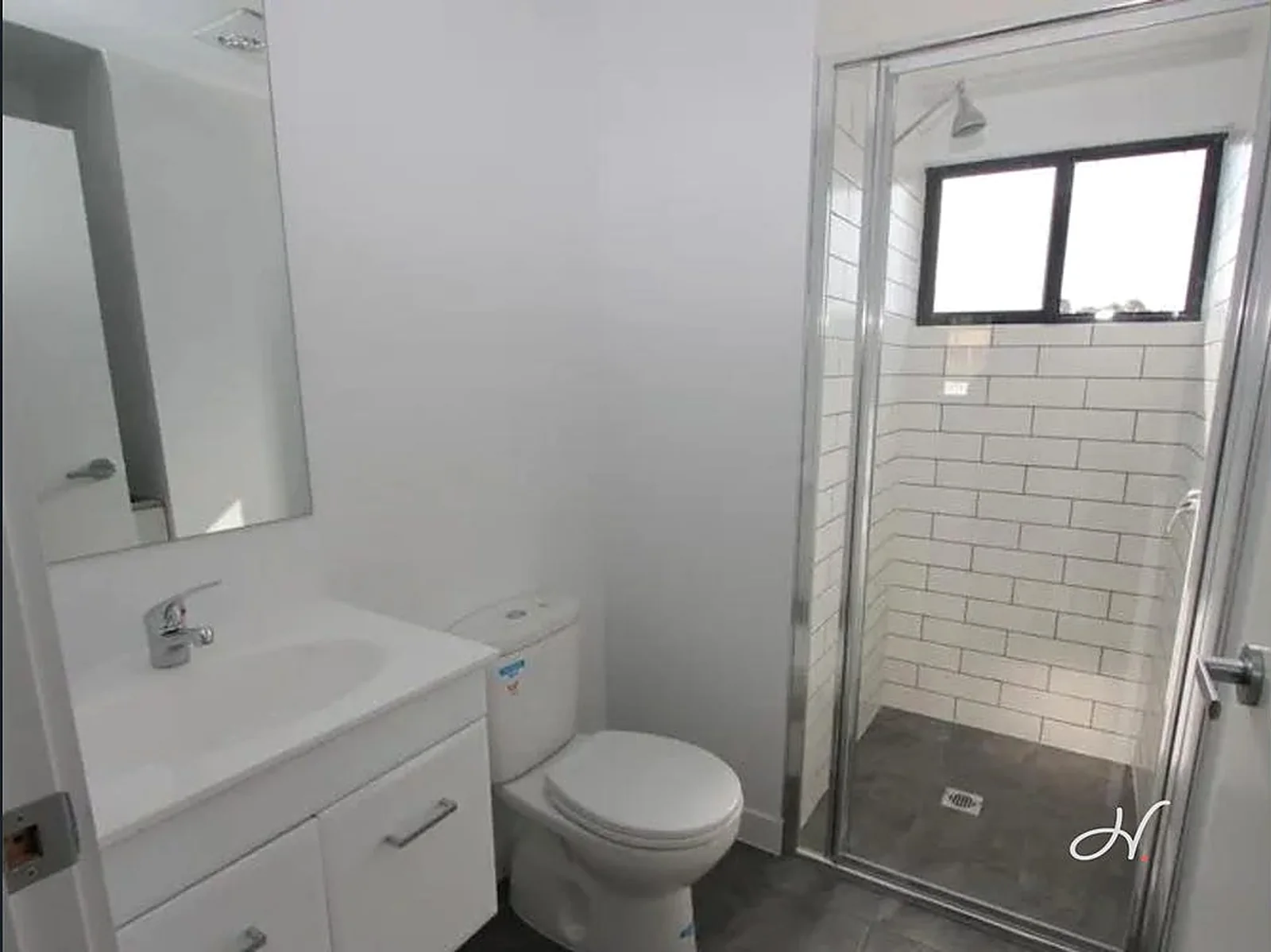 Modern bathroom with walk-in shower at the Wallsend home